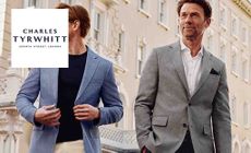 Charles Tyrwhitt Logo placed over an image of two men in suits