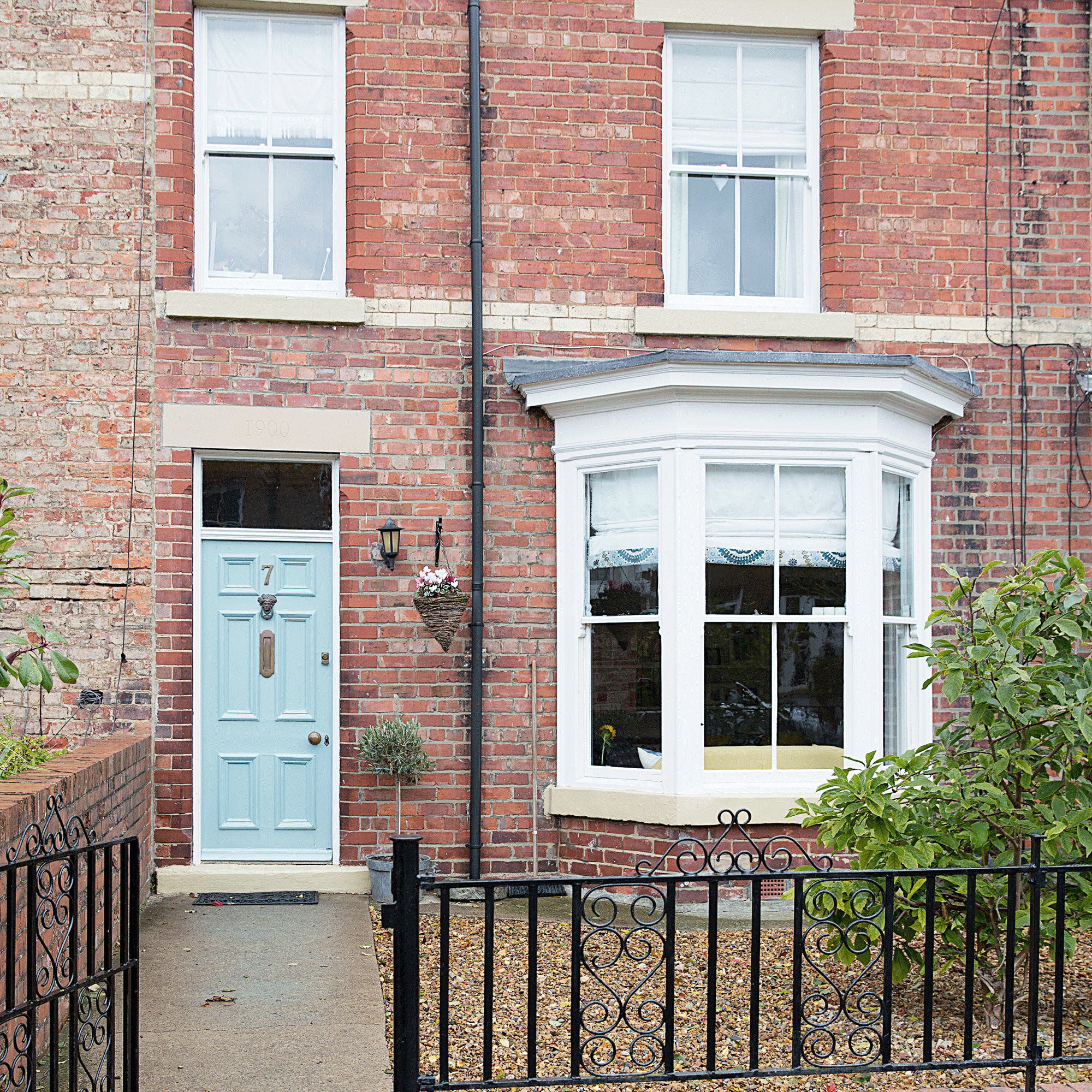 House exterior with blue door