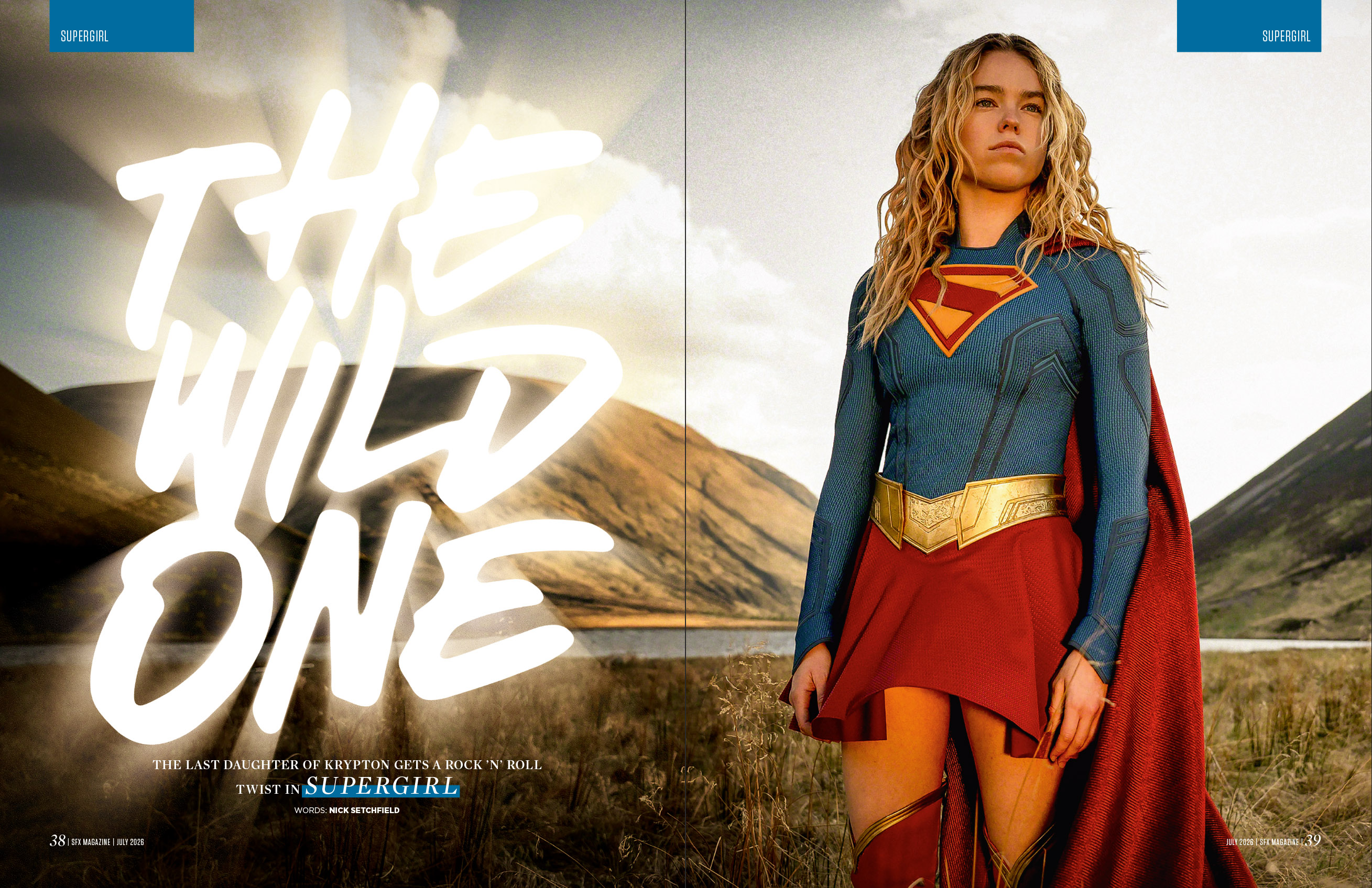 A costumed Supergirl standing in a natural landscape.