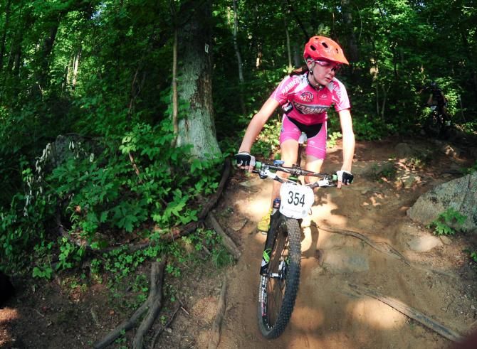 Emma Drumond riding roots and rocks on her way to second place