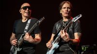 A photo of Joe Satriani (keft) and Steve Vai (right) performing onstage