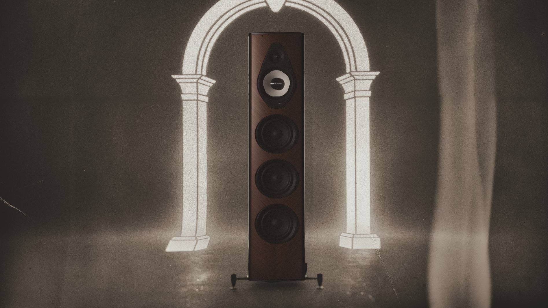 The Sonus faber Olympica G3 inside a glowing arch.
