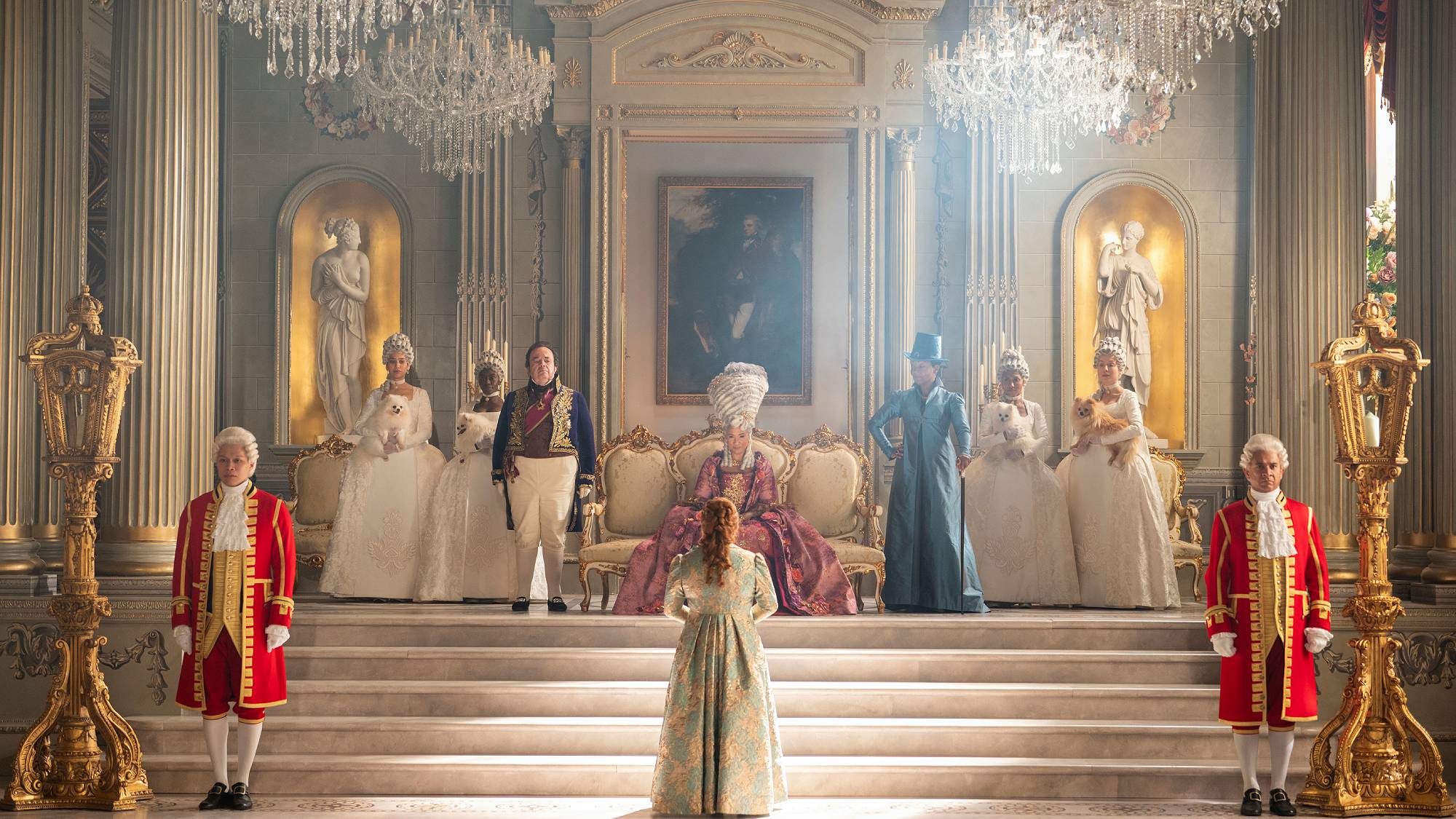 Hugh Sachs as Brimsley, Nicola Coughlan as Penelope Bridgerton, Golda Rosheuvel as Queen Charlotte, and Adjoa Andoh as Lady Danbury in "Bridgerton" season 4 part 1 on Netflix