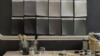 wall with paint cards to show how to choose the perfect shade when decorating with grey
