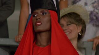 Grace Jones dressed up at a horse race in A View To A Kill.