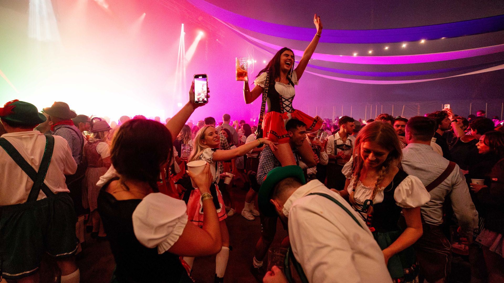 an image of a crowd of people celebrating at Oktoberfest in London