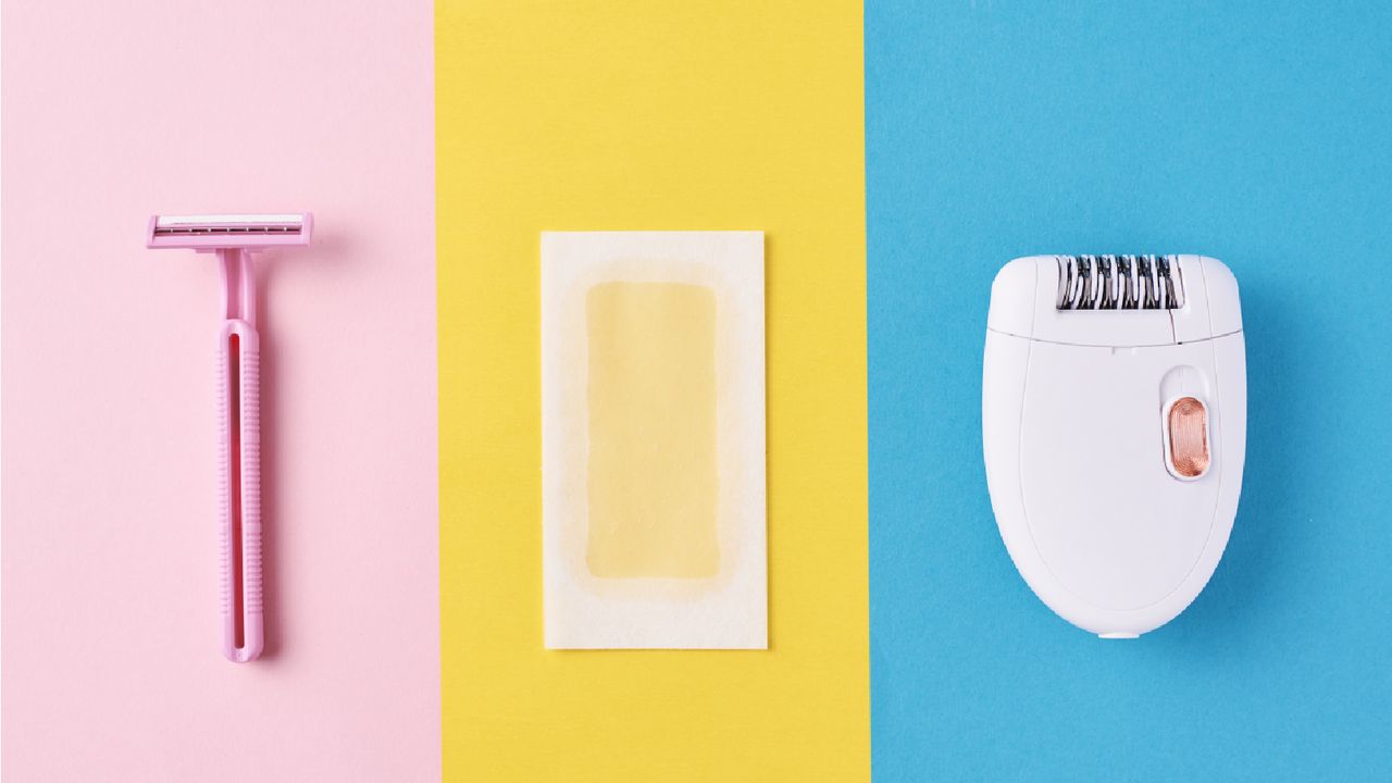 Flatlay of a pink razor, a wax strip and an epilator