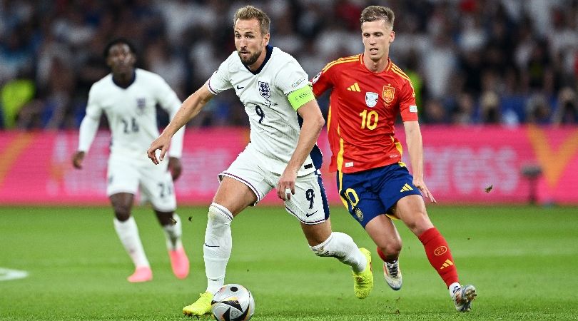 England&#039;s Harry Kane and Spain&#039;s Dani Olmo compete for the ball in the final of Euro 2024.