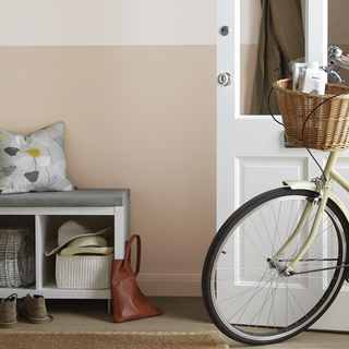 room with cycle and white door