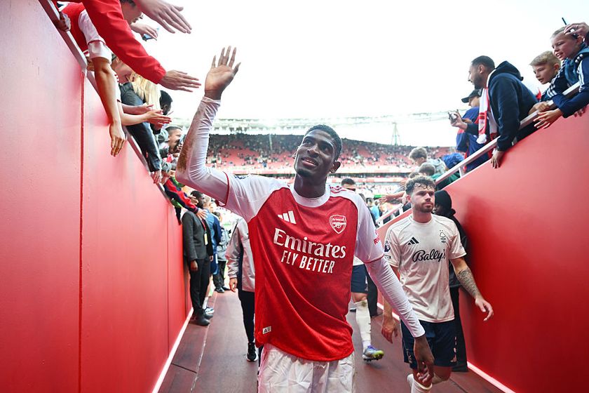 Cristhian Mosquera of Arsenal embraces fans after the team's victory during the Premier League match between Arsenal and Nottingham Forest at Emirates Stadium on September 13, 2025 in London, England.