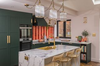 a kitchen with a striped tile backsplash