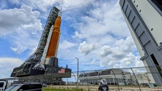 Artemis 1 rocket beside Vehicle Assembly Building at NASA's Kennedy Space Center