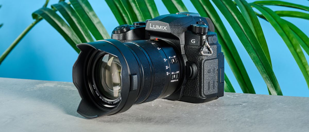 A black Panasonic Lumix G97 mirrorless camera