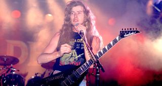 Dave Mustaine performs live with Megadeth in 1988 with a customized Jackson King V.