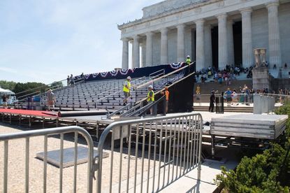 Workers prepare the Lincoln Memorial for Trump's July 4th party
