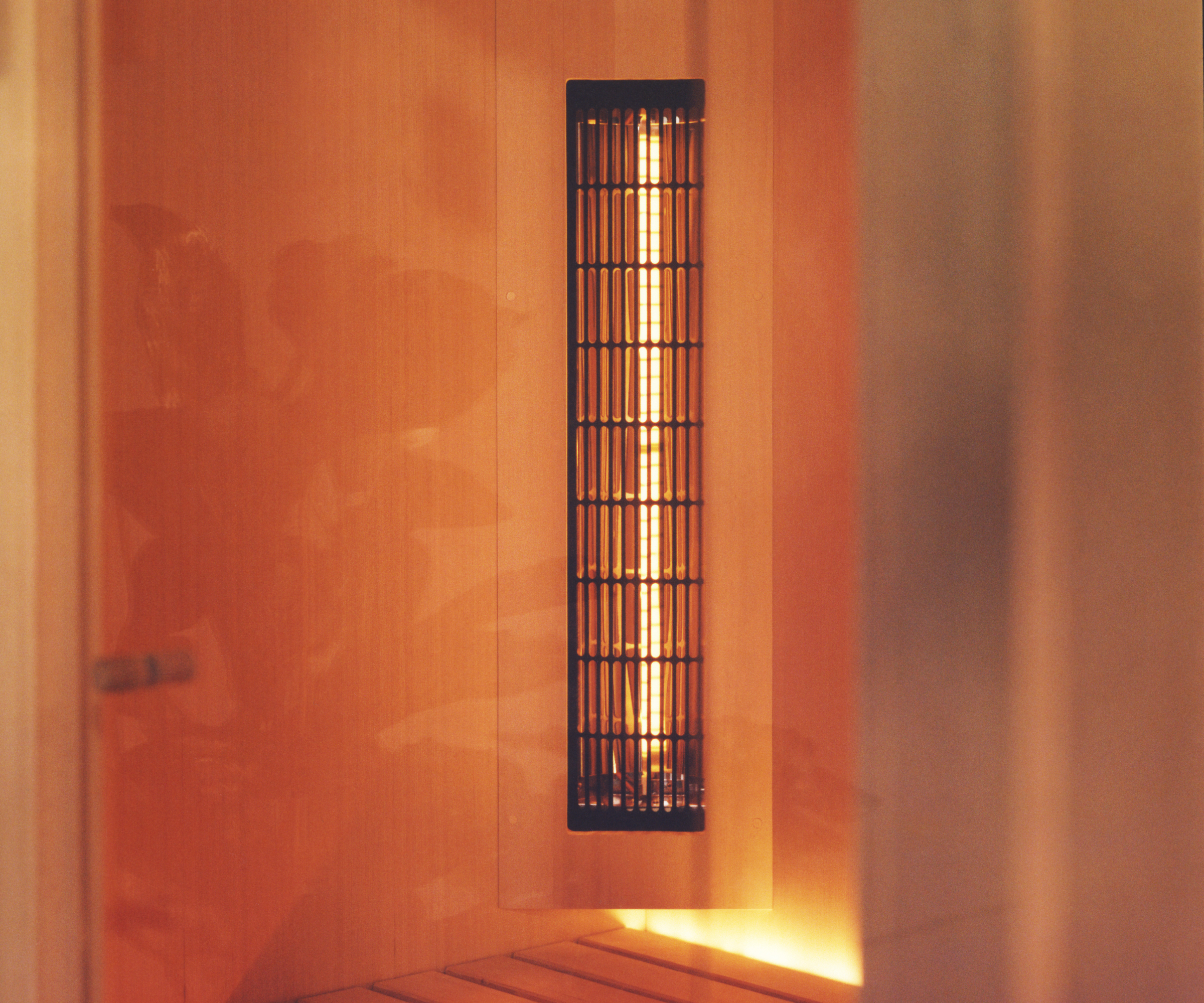 inside of a sauna with electrical heater