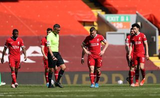 Liverpool players appear dejected