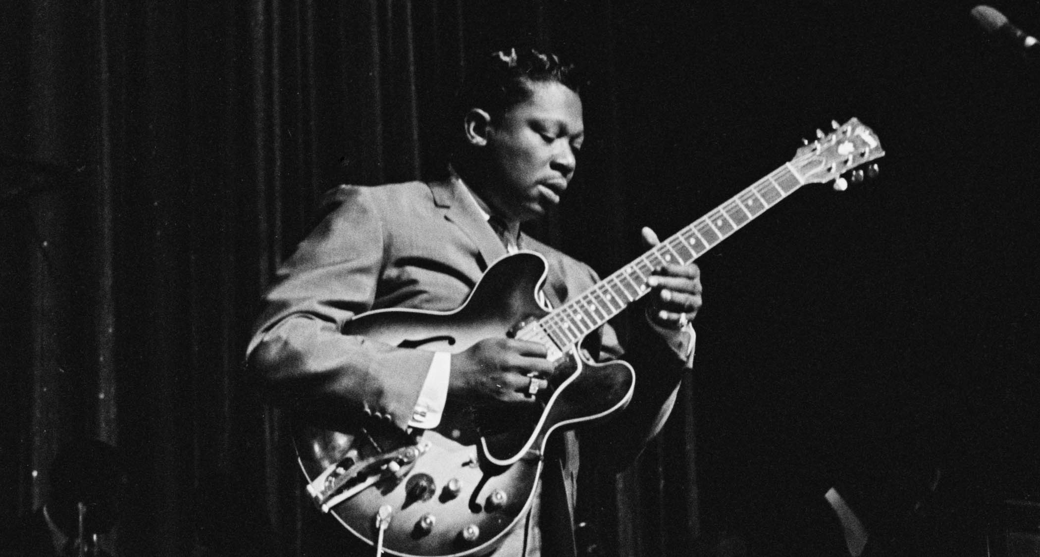 A classic black-and-white shot of B.B. King performing live in the mid '60s