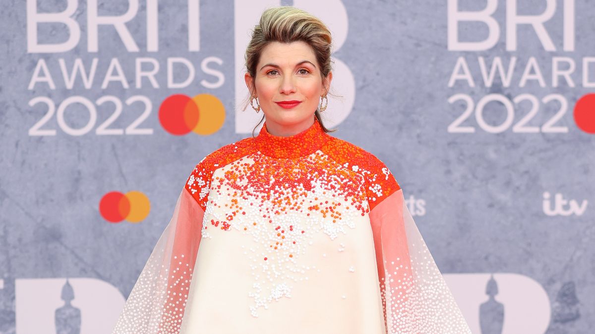 Time series 2 star Jodie Whittaker in a pink and white dress attending the 2022 BRIT Awards