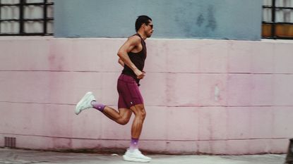 image of a runner training in an urban setting
