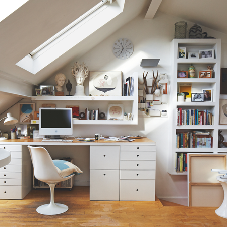 hite attic studio loft conversion, gabled ceiling, skylights, desk, wall storage unit, Saarinen Tulip swivel chair, iMac Apple Mac computer, wood flooring