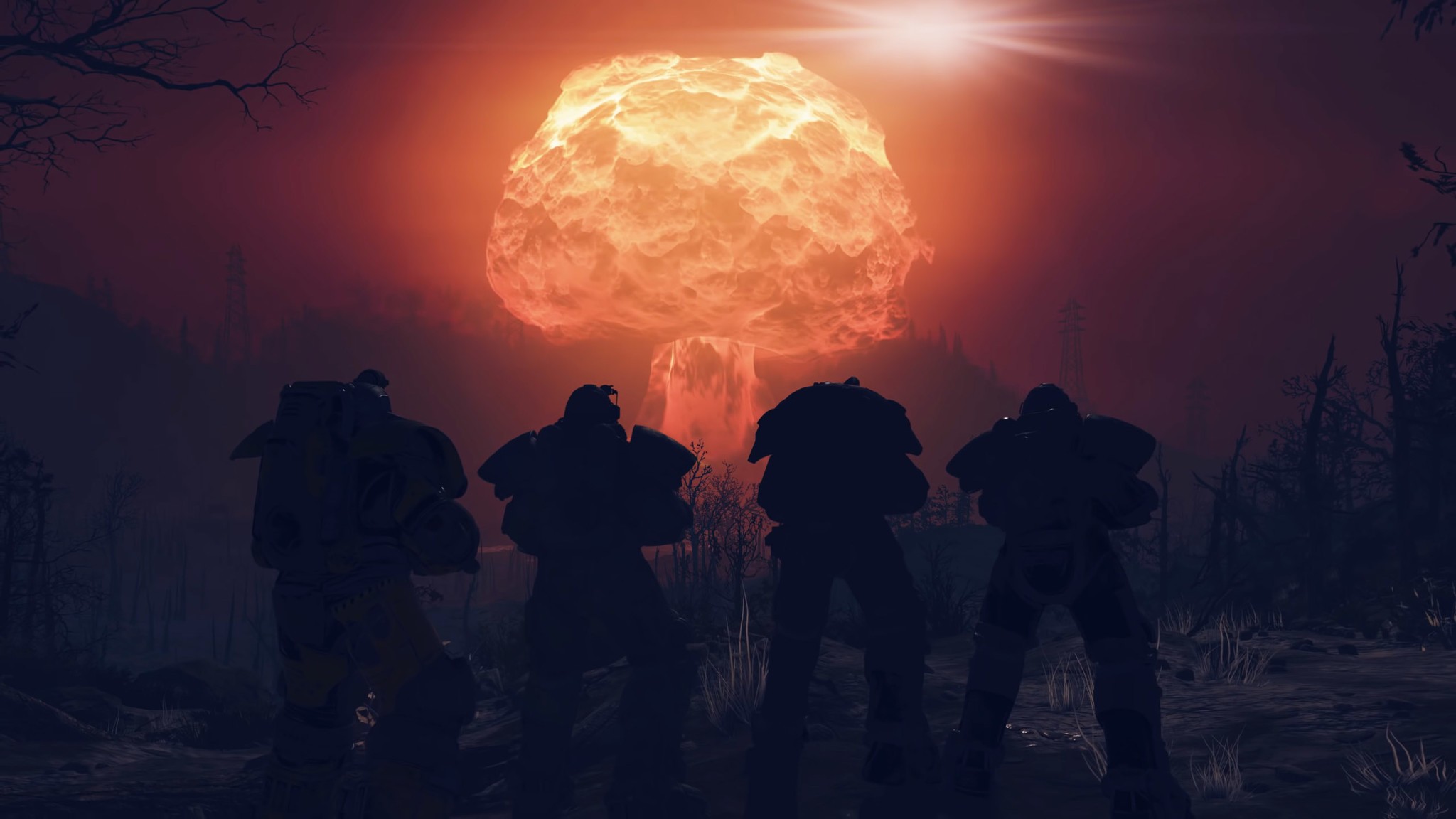 Four Fallout 76 players watch a nuke go off