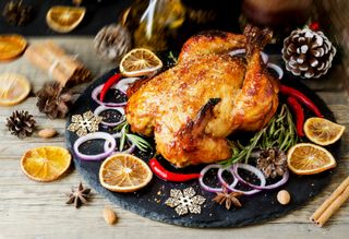 Roast turkey on a festive board Christmas dinner table