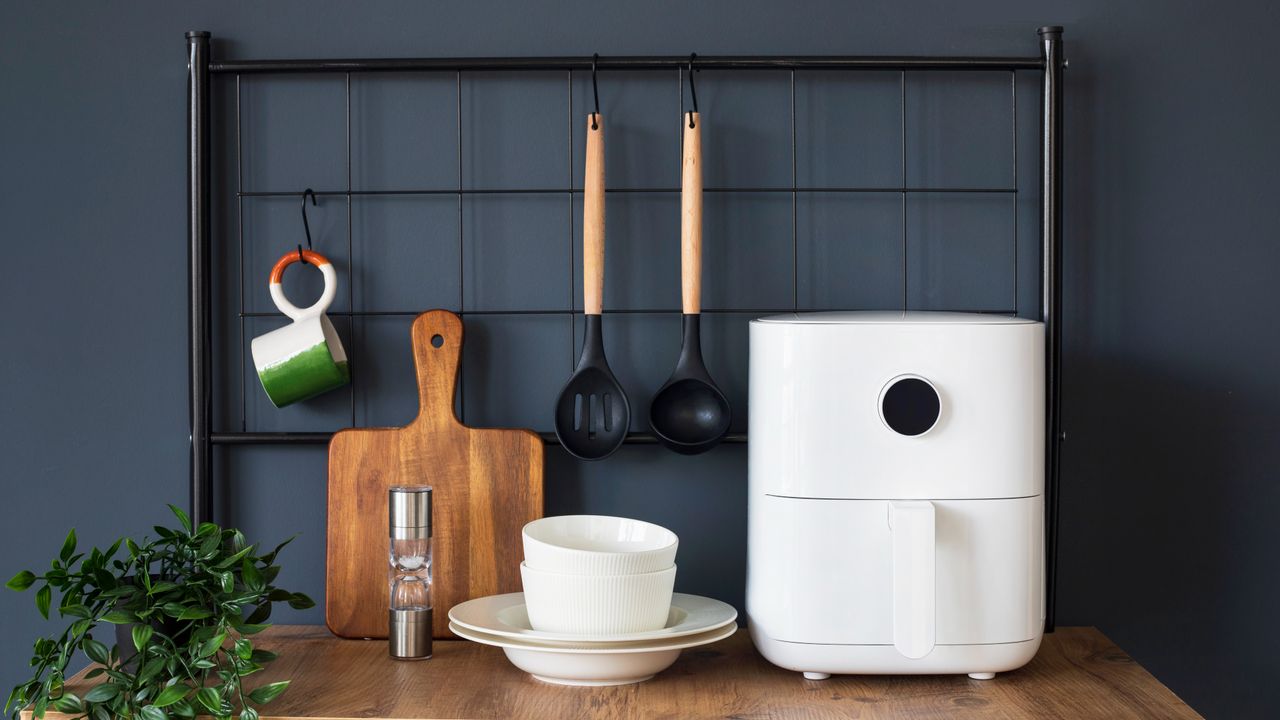 White air fryer on kitchen worktop