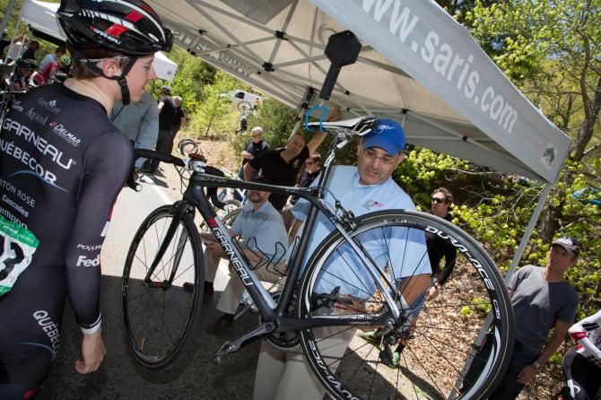 USA Cycling official Rey Trevino gives Zachary Hughes the bad news that his bike is below the weight minimum.