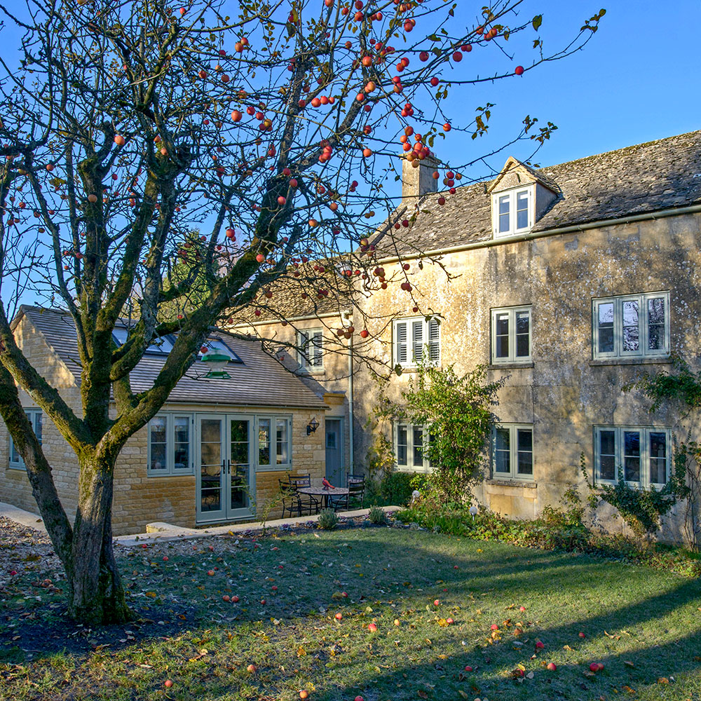 exterior of house with lawn and plants