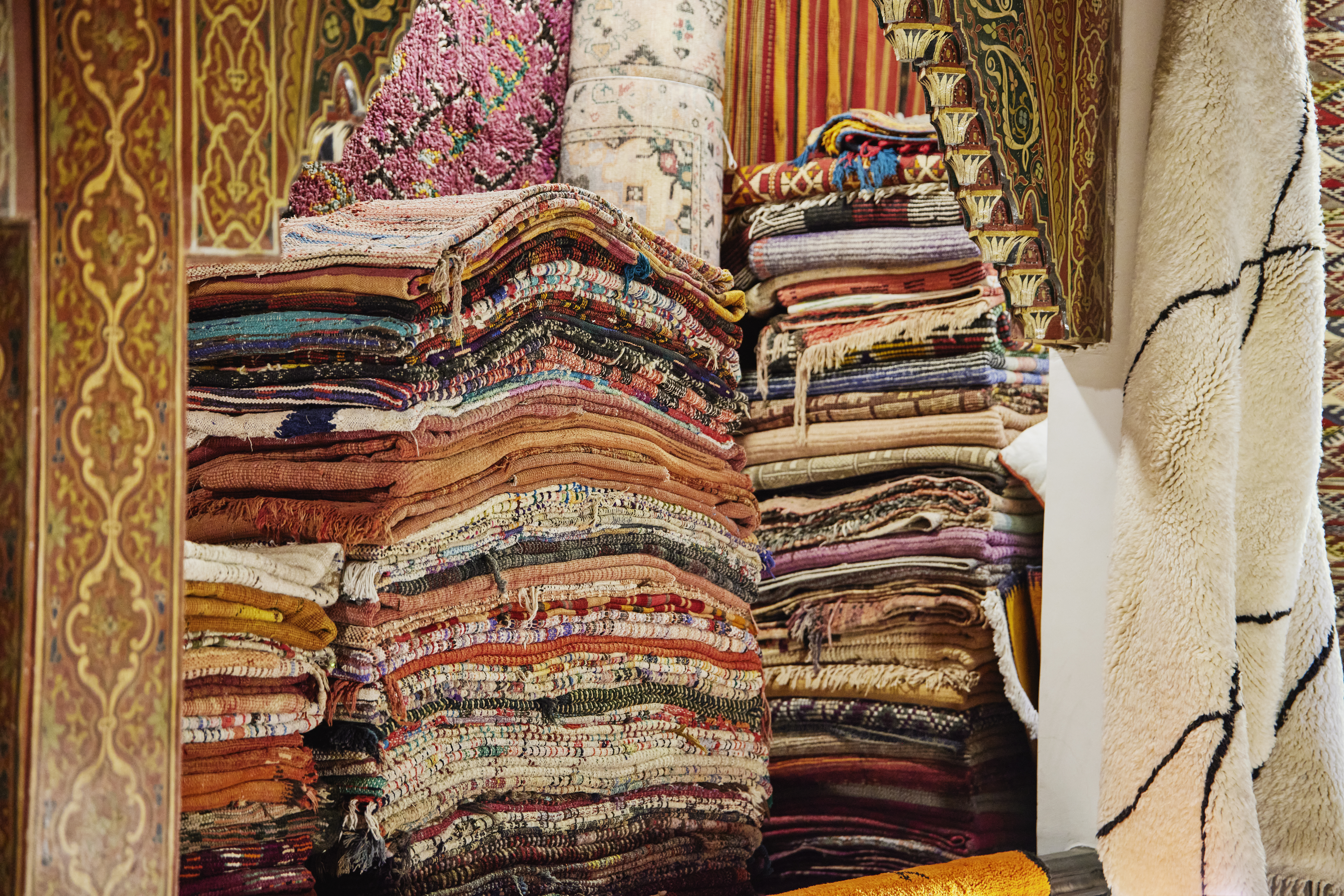 Pile of folded rugs in the Marrakech Medina