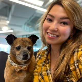 Sarah and Duke coordinating in yellow outfit and bowtie