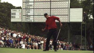 Tiger Woods celebrates winning the 1997 Masters