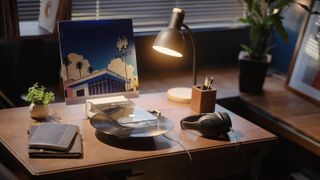 Toshiba's new portable turntable on an office desk 