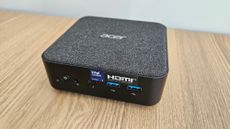The Acer Revo RB-102 on a desk 