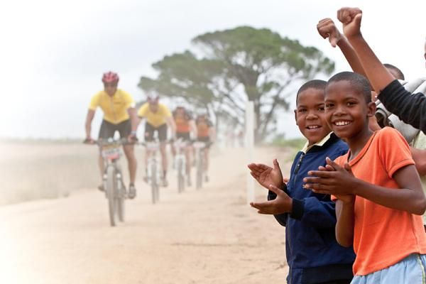 These farm children came out to support the riders during stage one