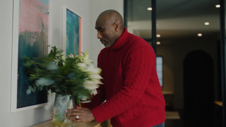 Sol Campbell turns around some lily white flowers, which is of course Spurs' longstanding nickname