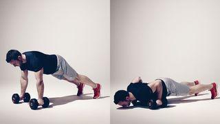 Man performs press-up while holding dumbbells