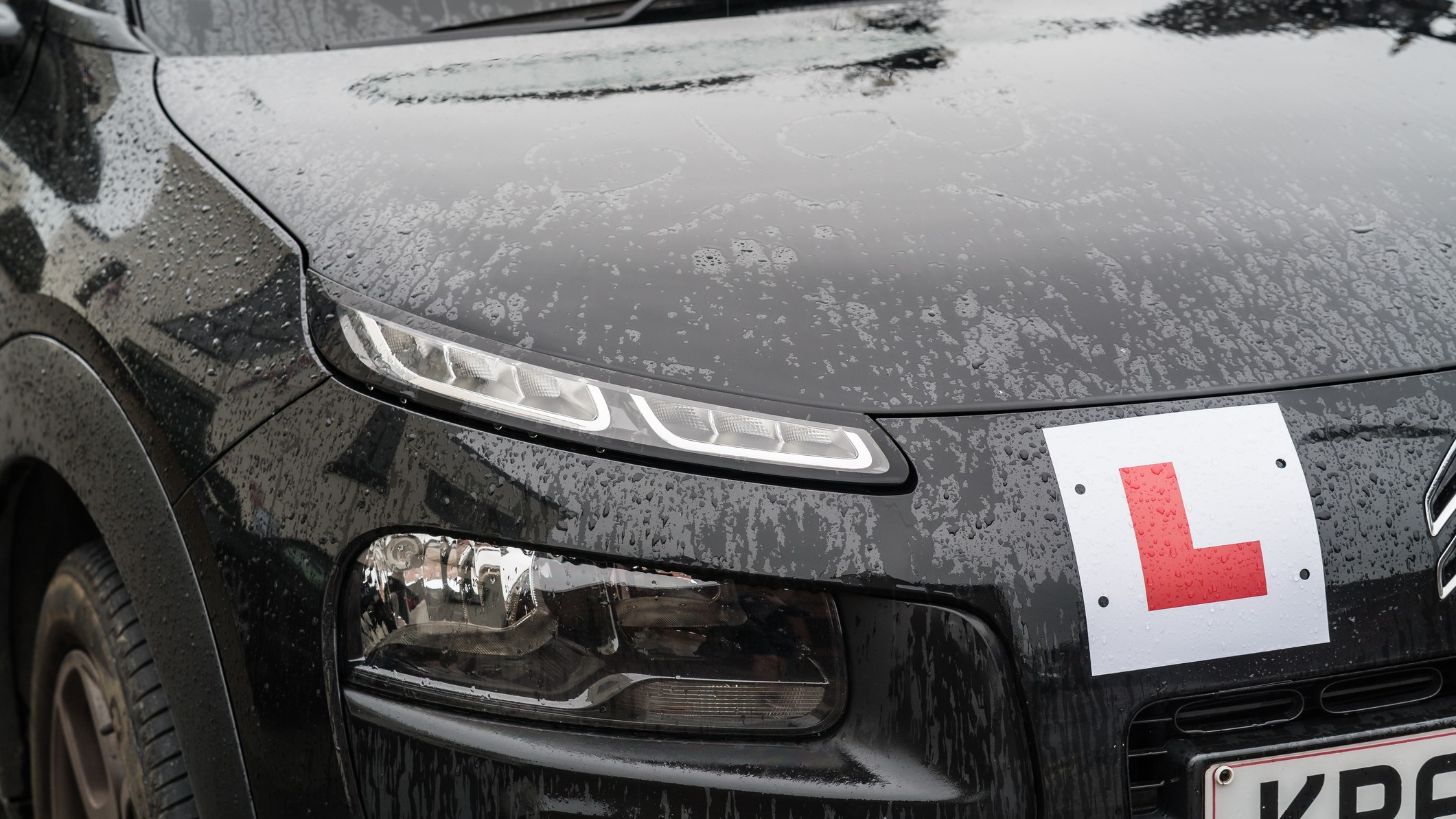 Nantwich, Cheshire, England, October 3rd 2025. A close-up of a black Citroen C4 Cactus with a Learner L Plate.