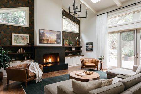 a living room with a feature wall