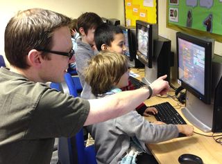 Working in schools, Code Club (www.codeclub.org.uk) volunteers mentor the next generation of coders