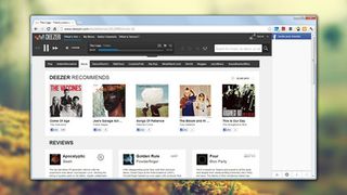 Deezer's What's Hot page features different categories and recent album reviews