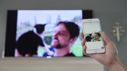 A photo of AllCast being used on a mobile phone and TV