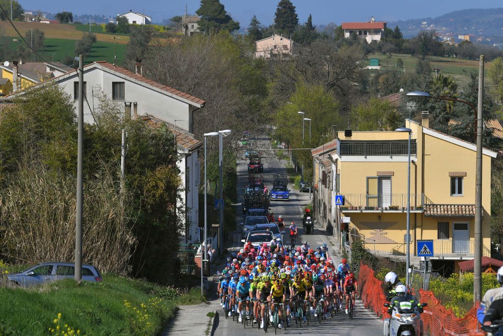 The peloton passes through a town during stage 5 of Tirreno-Adriatico