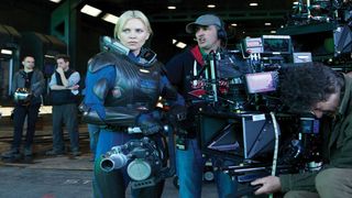 Prometheus: Charlize Theron in all her uniformed glory. Just look at that gun!