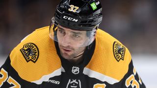 Patrice Bergeron #37 of the Boston Bruins looks on during the third period against the Boston Bruins at TD Garden 