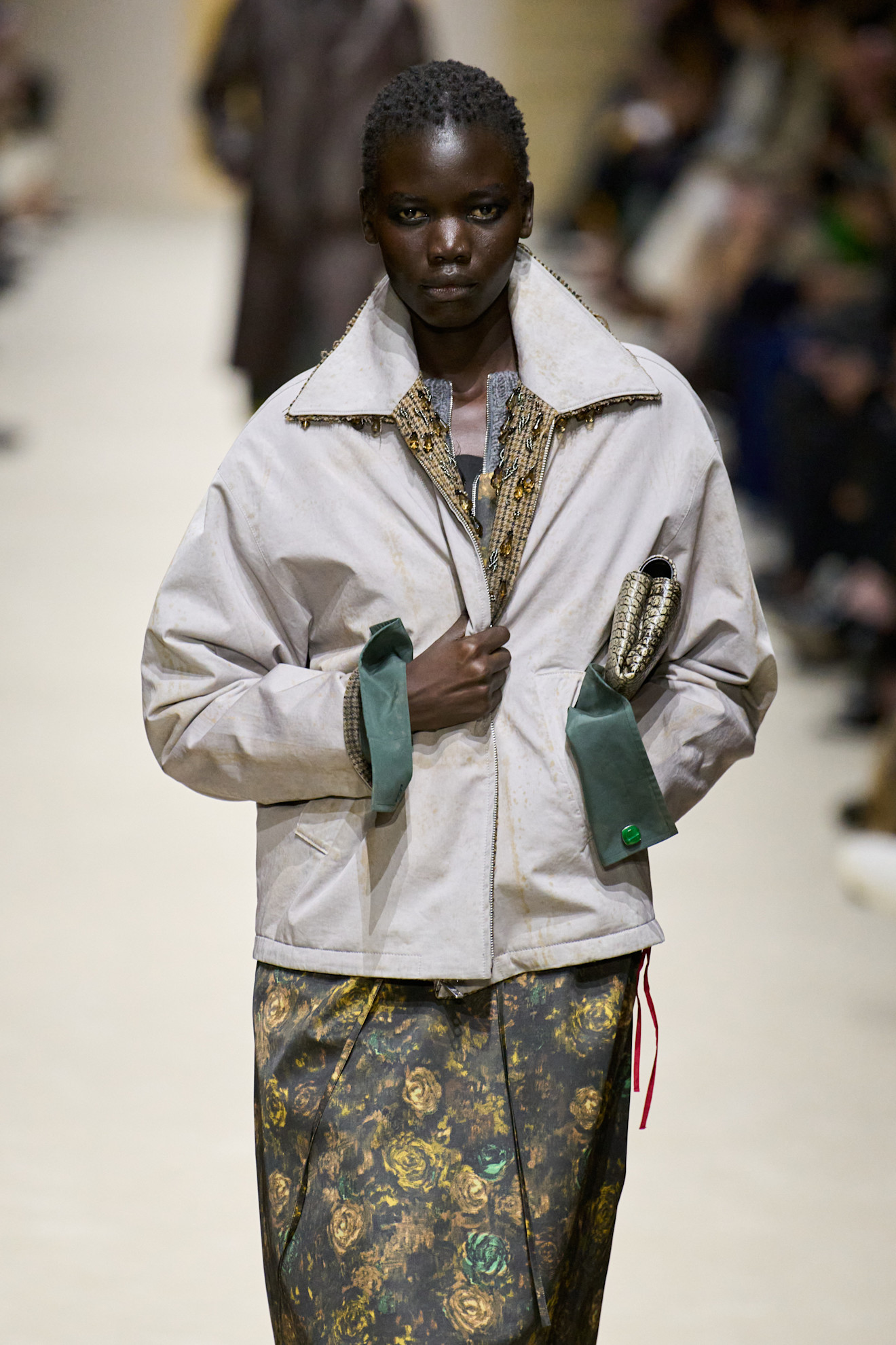 Model wears colourful cuffs on the A/W 26 runway