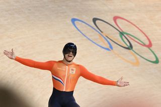 Netherlands' Harrie Lavreysen celebrates after winning the men's track cycling keirin final for gold of the Paris 2024 Olympic Games at the Saint-Quentin-en-Yvelines National Velodrome in Montigny-le-Bretonneux, south-west of Paris, on August 11, 2024. (Photo by SEBASTIEN BOZON / AFP)