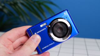 A blue AgfaPhoto Realishot DC5500 compact camera