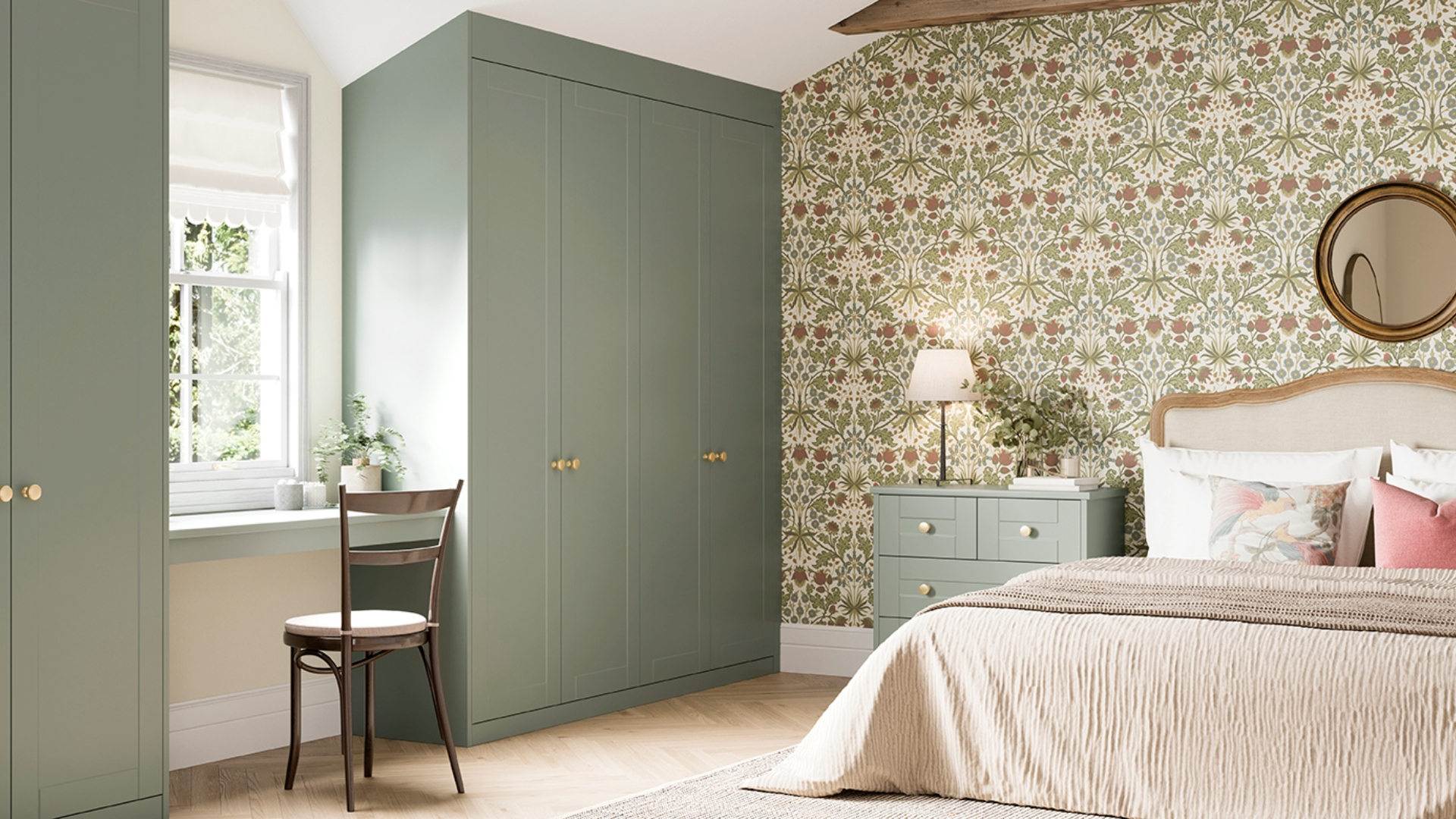 Chintzy wallpaper in green bedroom